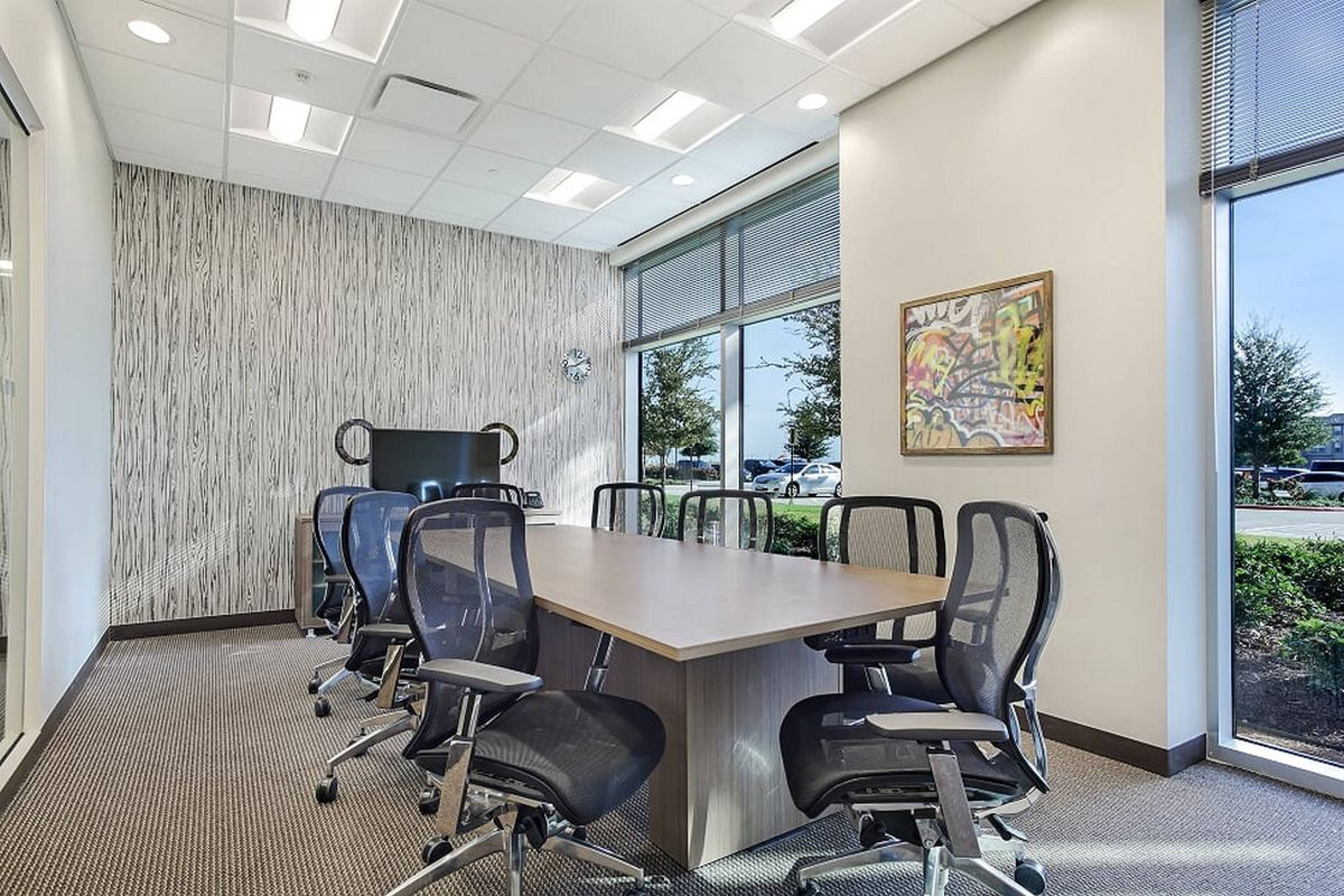 Photo of office table with chairs